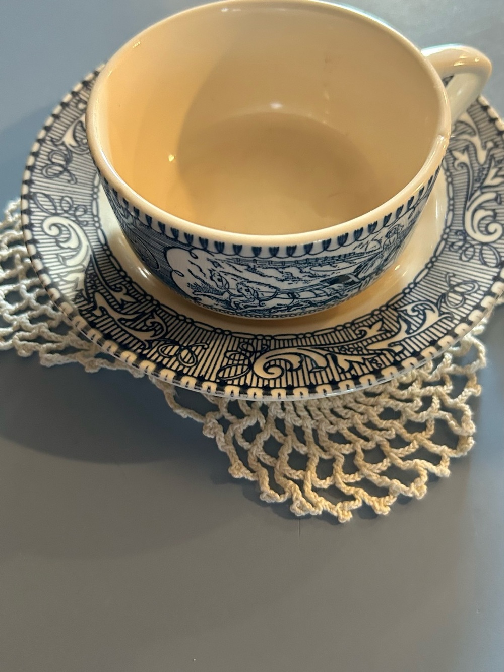 Blue and White Porcelain Teacup with Matching Saucer
